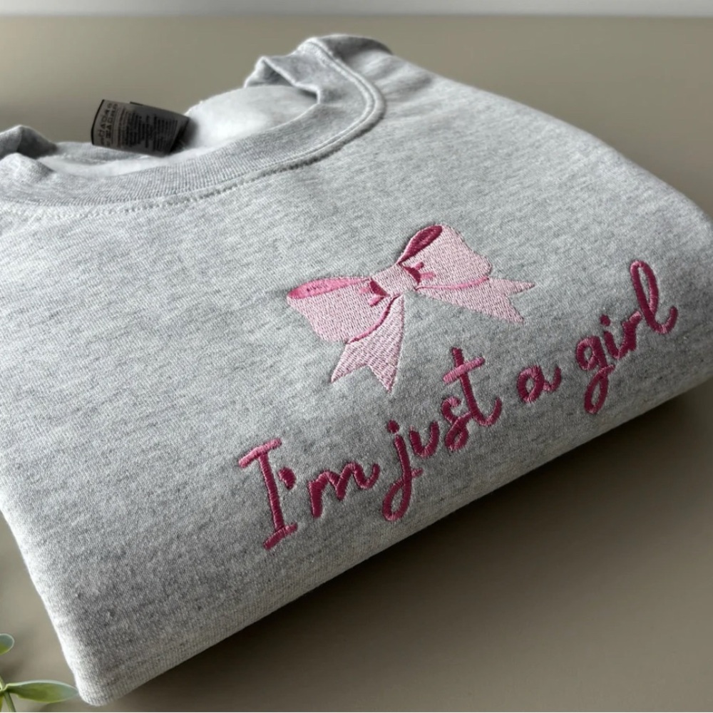 JUST A GIRL EMBROIDERED SWEATSHIRT